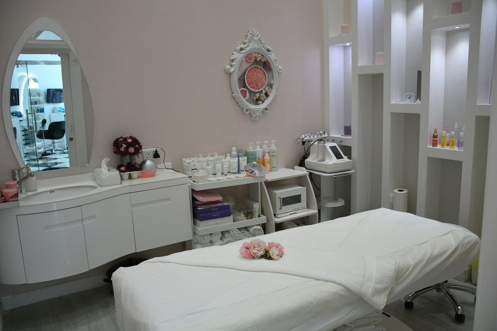 A calm SKIN THEORY treatment room prepared for a private consultation