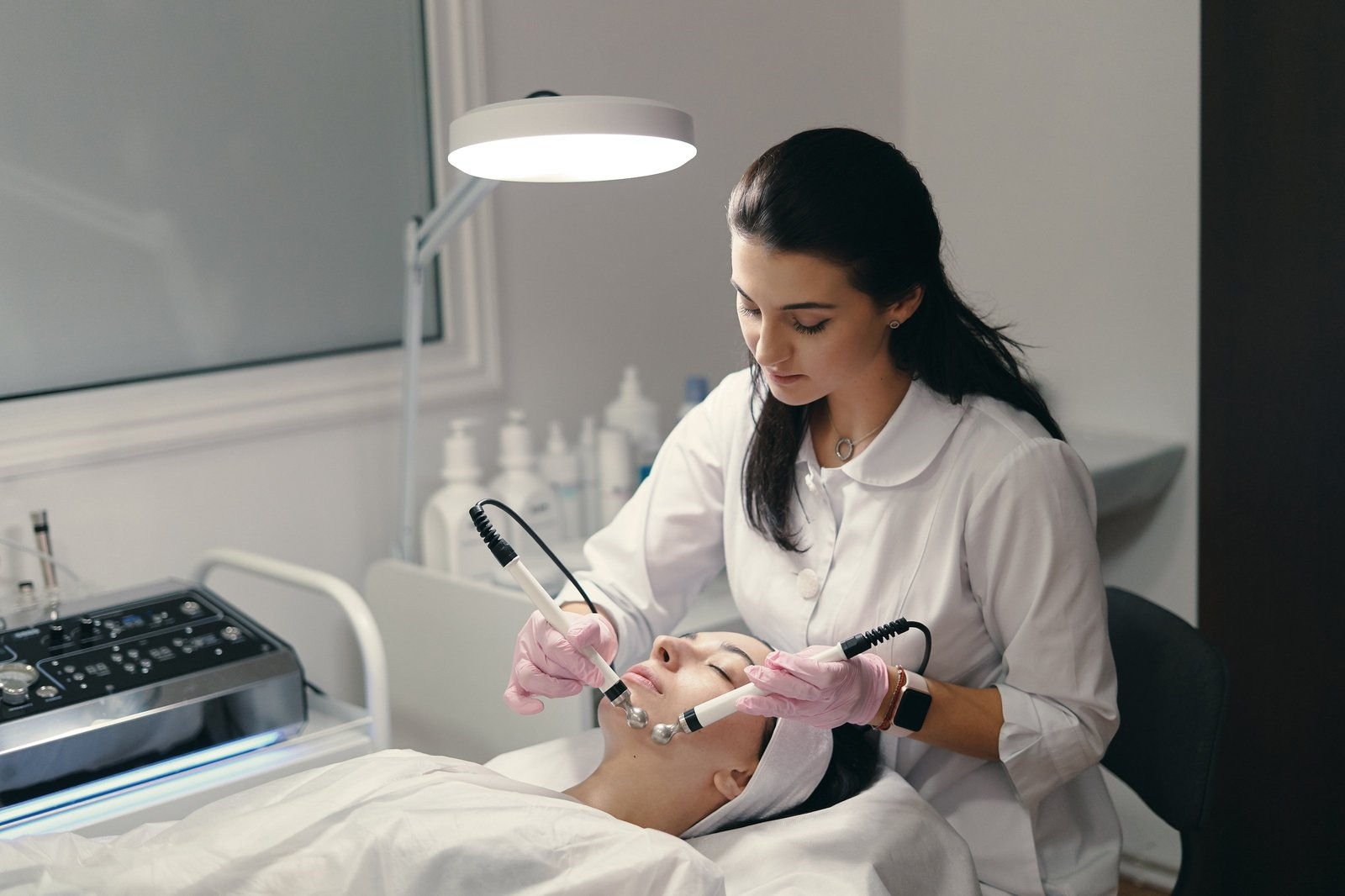 Clinician giving a rejuvenating facial treatment (sample photo)